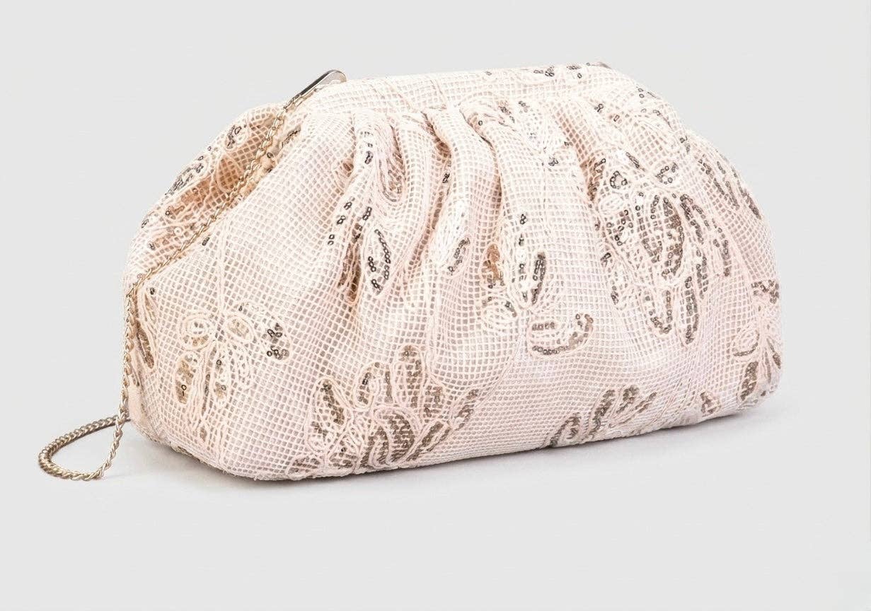 Chloé Millaut - Håndholdt sort clutch i stof prydet med blomsterprint og palietter